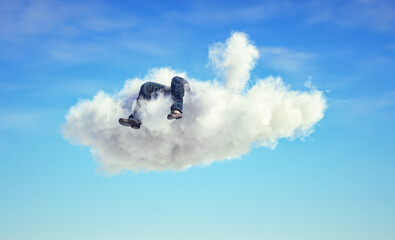 Man lays down on a cloud . Dreaming and aspiration concept.