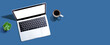 © Tierney - Laptop computer with a coffee cup from above