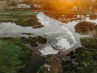 Sticker - Aerial view of a lake in the countryside at dreamy sunlight