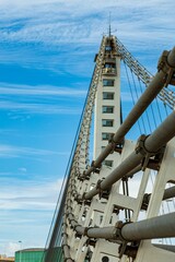 Puente del Bimilenario bridge against the blue bright sky in Spain