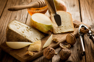 Wall Mural - traditional italian cheese with pear honey and nuts