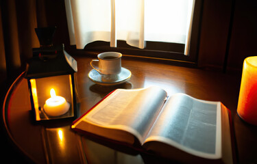 Wall Mural - An open bible with coffee cup for morning devotion on wooden table with window light.
