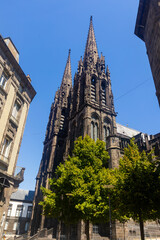 Wall Mural - Towering over Clermont-Ferrand city gothic cathedral Notre-Dame-de-l'Assomption building from black lava, France