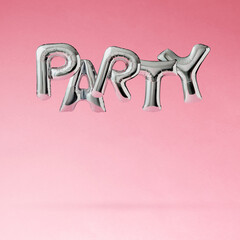 Wall Mural - Letter-shaped helium balloons float on a pink pastel background and spell out the word PARTY. Minimal Celebration Concept.