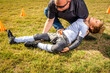 Youth Child Boy Soccer Player Unconscious Injury on Soccer Field With Coach