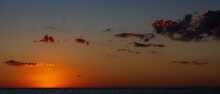 Birds Fly Off Into The Sunset Over The Gulf Of Mexico Off Siesta Key Florida