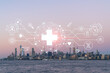 New York City skyline from New Jersey over Hudson River with Hudson Yards skyscrapers at sunset. Manhattan, Midtown. Health care digital medicine hologram. The concept of treatment, disease prevention