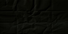 Black Crumpled Paper Texture Background. Clean Black Paper. Top View.