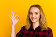 © Tetiana - Portrait of attractive lovely girl showing ok-sign ad solution good choice isolated on bright shine color background