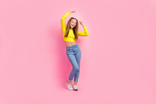 Full Length Photo Of Excited Dreamy School Girl Dressed Yellow Crop Top Dancing Closed Eyes Isolated Pink Color Background