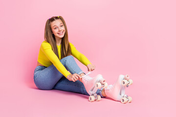 Sticker - Full length photo of cool shiny school girl dressed yellow crop top tie rollers empty space isolated pink color background