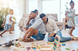 © David L/peopleimages.com - Tired parents, children playing in living room and running in with adhd energy, burnout parents and happy kids run for crazy fun. Child development, growing up and play in lounge family home together