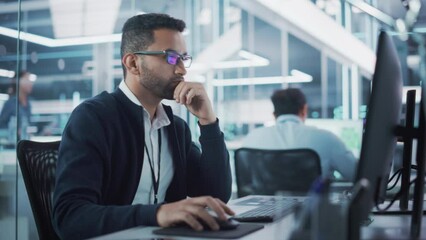 Leinwandbilder - Portrait of Multiethnic Industrial Engineer Developing 3D Model of a Circuit Motherboard on Computer CAD Software in a Factory. Modern Technological Research and Development Center.