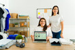 © AntonioDiaz - Young women working together on their online shop