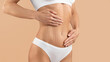 © Prostock-studio - Tummy Tuck. Cropped Of Female Body With Flat Abdomen And Drawn Mesh