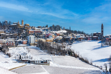 Sticker - Small town on the hill covered in snow in Italy.