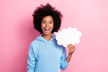 Photo Portrait Of Charming Pupil Girl Hold Bubble Speech Cloud Talk Excited Dressed Stylish Blue Clothes Isolated On Pink Color Background