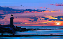 Lighthouse On The Coast At Sunset