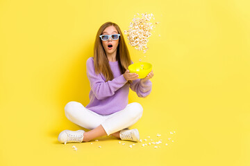 Wall Mural - Photo of shocked lady enjoy rest winter evening watch horror throwing spilled pop corn empty space isolated on yellow color background