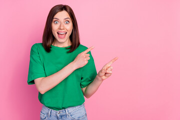 Canvas Print - Portrait of young attractive funny grimace woman pointing empty space shock low price isolated on pink color background