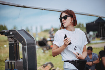 Wall Mural - Director at work on the set. The director works with a group or with a playback while filming a movie