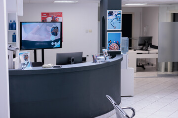 Wall Mural - Unoccupied hospital lobby with unused computers. Administrative area with no people from medical clinic with no doctors or specialists checking patients. Sanatorium hallway with no practitioners.