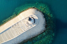 Amazing Aerial View Of Lighthouse And Dam On Lustica Bay Near Tivat, Montenegro On Sunny Day.