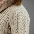 © Michele - Close Up of a Cozy Cable Knit Sweater on a Cold Day