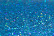 Macro image of a sparkling blue color glitter texture background