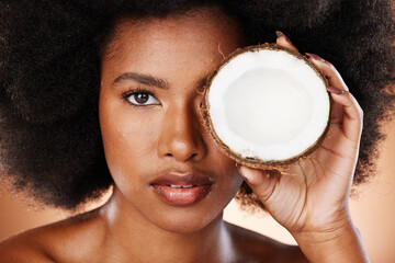 Wall Mural - Beauty, skincare and black woman with coconut for a cosmetic healthcare product, healthy skin treatment and natural wellness. Organic health portrait, clean diet and self care nutrition studio mockup