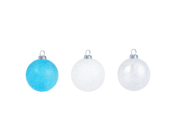 Wall Mural - three isolated shiny christmas ornaments closeup