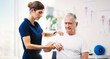 © Sean A E/peopleimages.com - Nurse, patient and physical therapy for elderly care, medical or healthcare support at the clinic. Woman physiotherapist or chiropractor helping mature man in physiotherapy or arm stretching
