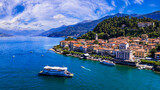 One of the most beautiful lakes of Italy - Lago di Como. aerial panoramic view of beautiful Bellagio village and ferryboat.  popular tourist destination