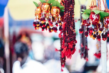 Sticker - Close-up of gold Hindu jewelry at Hindu temple markeht in India