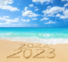2022 And 2023 On A Beach Sand