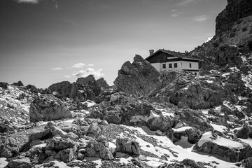 Sticker - abandoned wooden mountain hut in Dolomites Italy