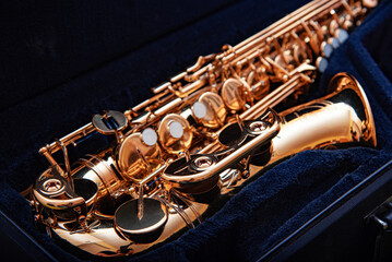 Saxophone. Golden Saxophone in a case close-up.