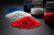 color red blue and white plastic polymer petrochemical product as polymer raw material for plastic in polymer chemical industry business design and test by engineer in polymer science laboratory