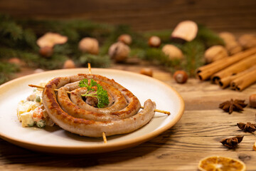 Wall Mural - Christmas wine sausage served with potato salad