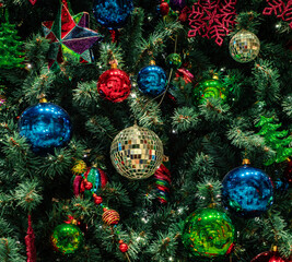 Wall Mural - christmas tree with decoration, balls and bright sparkling lights. bokeh garlands wallpaper. new yea