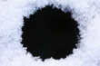 © stuart - Close-up of icy snow texture make round frame or border for abstract winter background