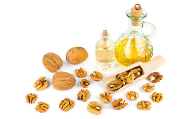 Wall Mural - Walnuts and natural walnut oil isolated on white