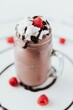 Closeup shot of an appetizing raspberry chocolate milkshake
