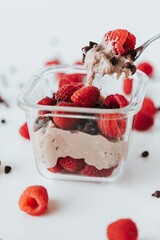 Sticker - Closeup shot of a raspberry and chocolate dessert in a cup