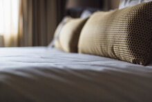 Close-up Of Pillows On Bed In Hotel Room