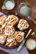 High Angle View Of Cinnamon Buns Bundt Cakes Served On Wooden Table At Home