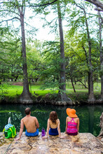 The Blue Hole In Wimberley, Texas Is A Popular Destination For Tourists And Locals On Hot Summer Days. The Clear, Cool Water Flows Through Cypress Trees And Offers A Refuge From Th