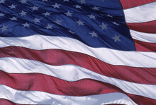 Close-up Of The American Flag Waving In The Wind.