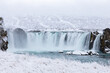 Godafoss waterfall in iceland in the snow