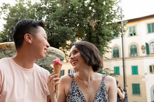 Happy Couple Enjoying Gelato In Florence Italy